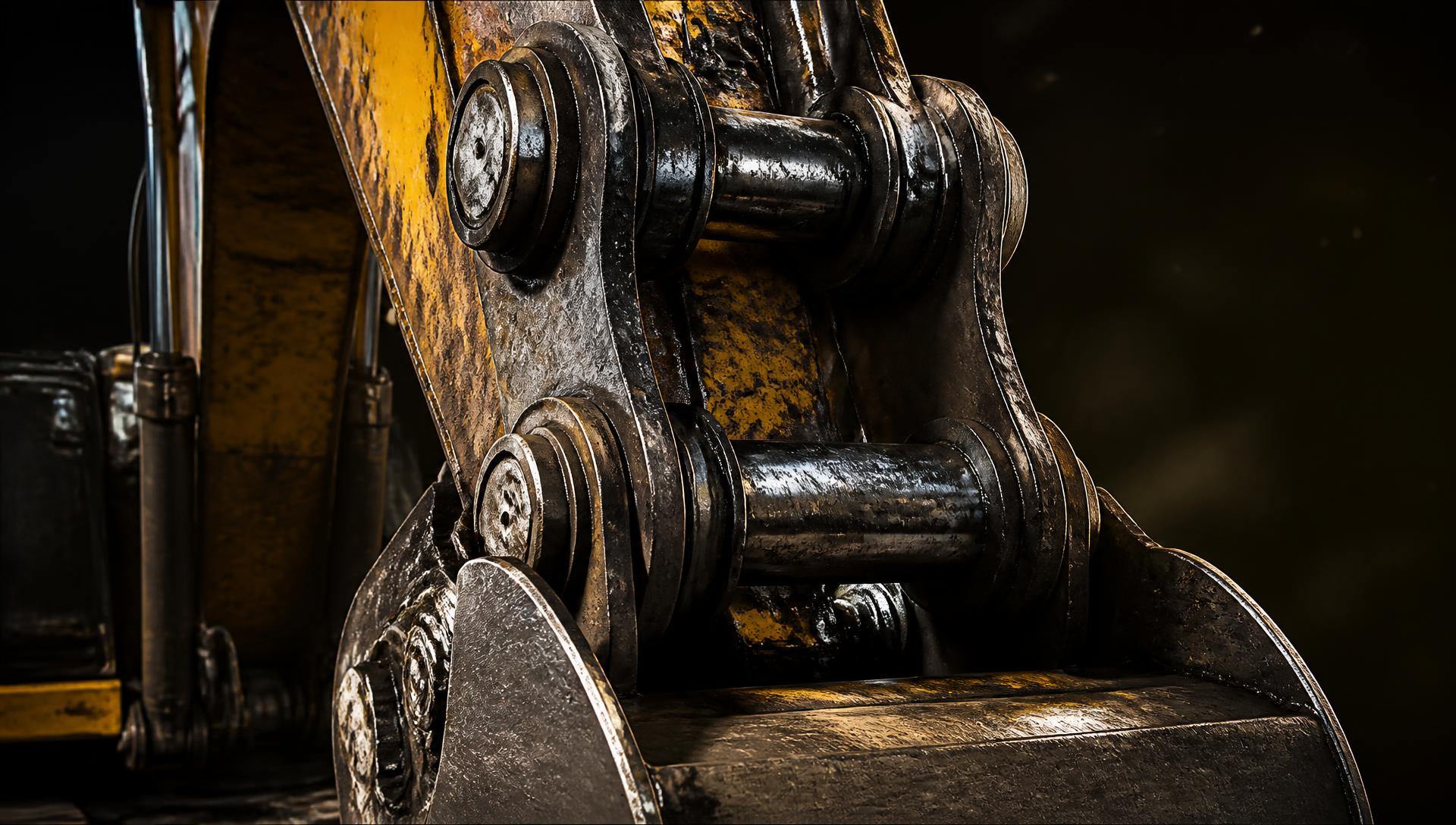 Close-up of excavator bucket pins and bushes on a heavy machine arm